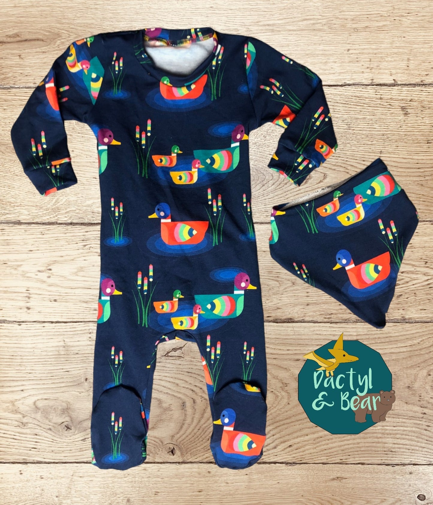 Babygrow and bib set
